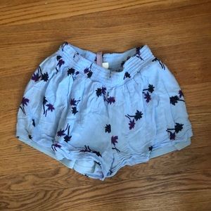 Francesca’s Flowy Palm Tree Shorts